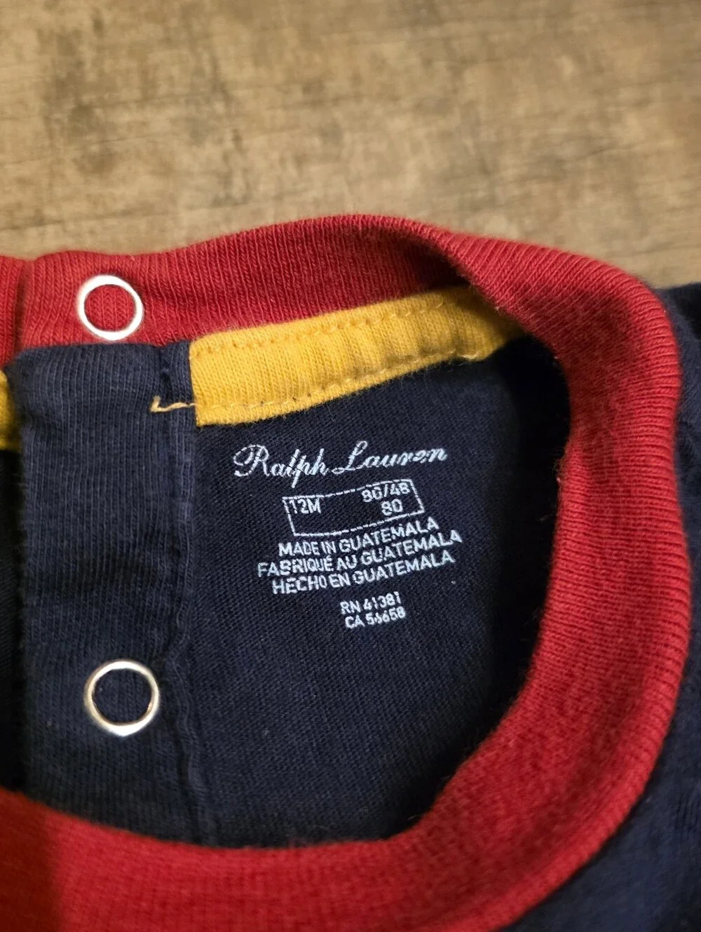Baby Ralph Lauren Navy Blue Romper with Polo Bear and Red, Yellow, Green Trim